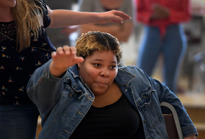 Teen dancing at her party.